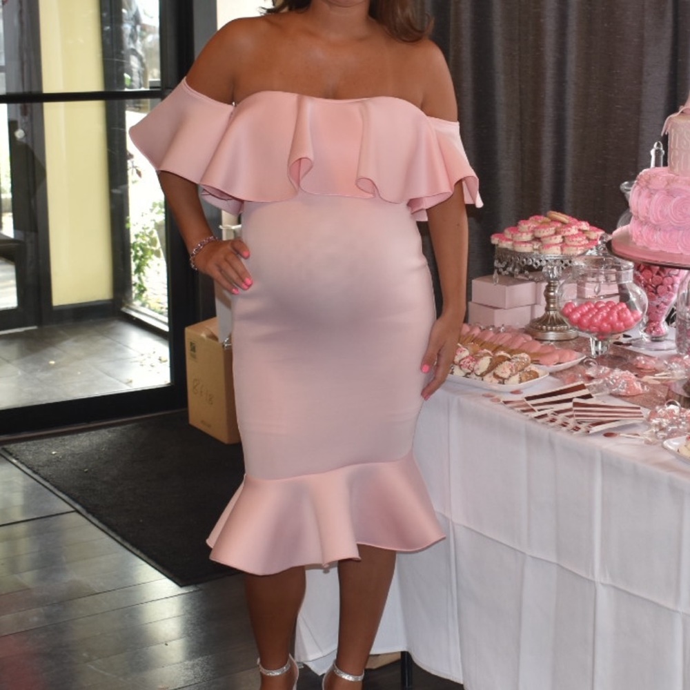 Pink off the shoulder fitted maternity dress.
